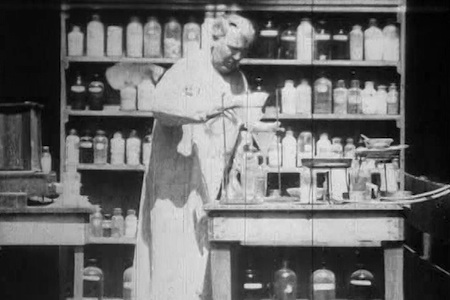 MR. EDISON AT WORK IN HIS CHEMICAL FACTORY